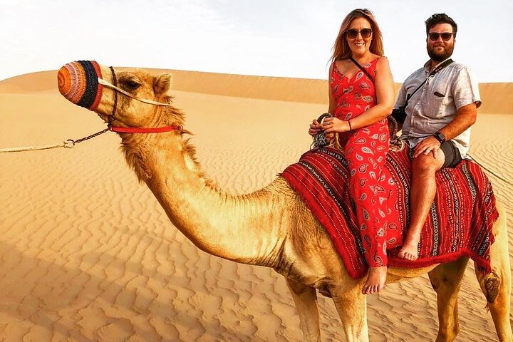 Experience the joy of camel riding across endless golden sands where every moment creates lasting memories and every backdrop is perfect for stunning photographs in the desert's warm glow.